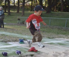 Image: Tot long jump